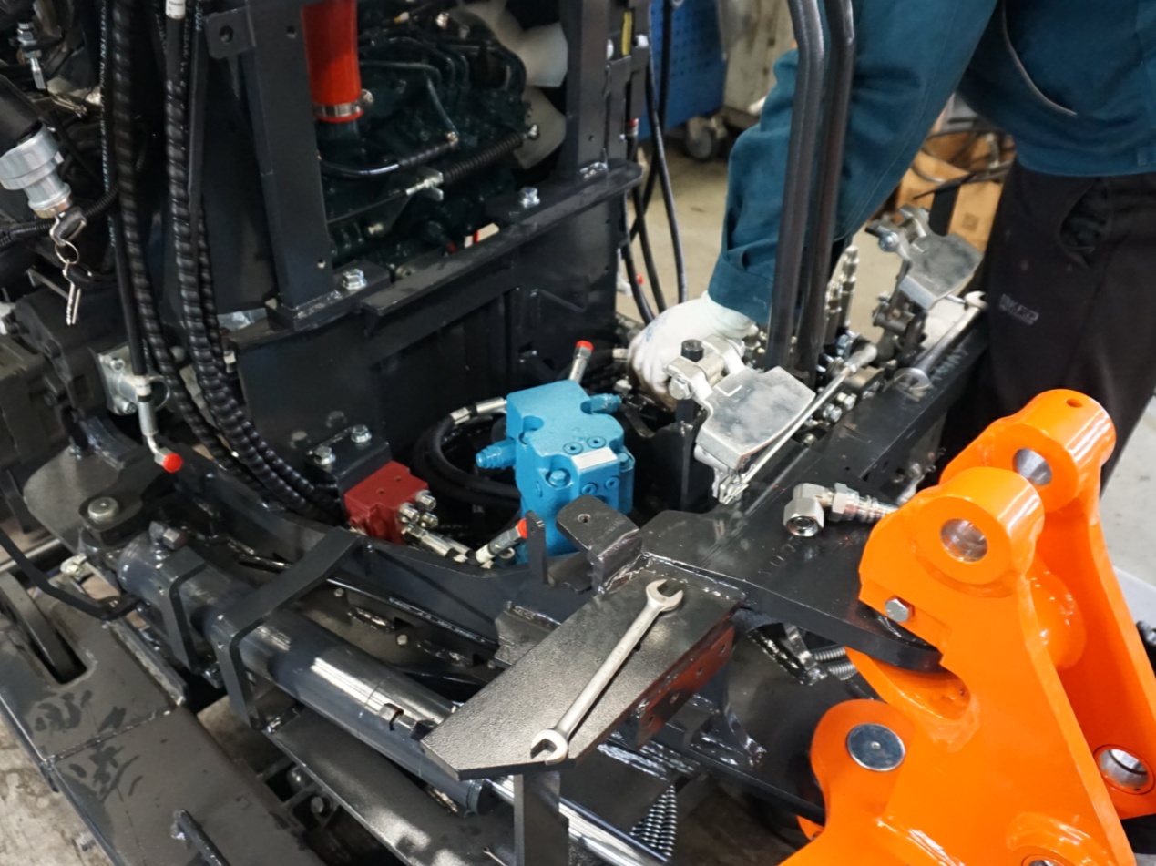 Explore the mini excavator assembly workshop